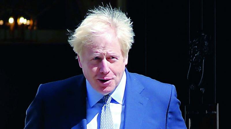 UK PM Boris Johnson launches new COVID-19 alert system as lockdown rules ‘modified’