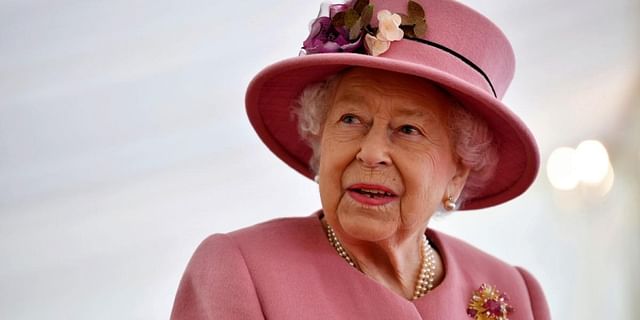 Queen Elizabeth II decides to stay on at Scottish castle after a worker tests positive for Covid