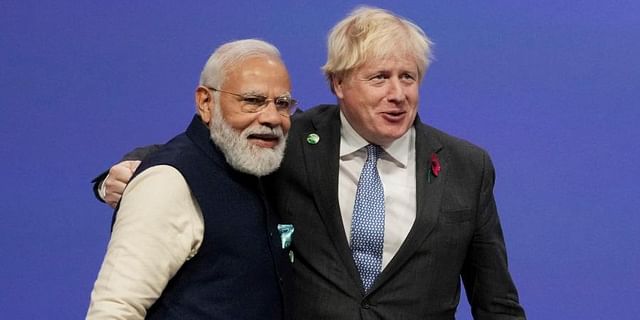 PM Narendra Modi warmly greeted by British counterpart Boris Johnson at climate summit venue