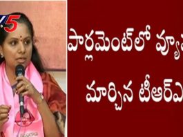 474025